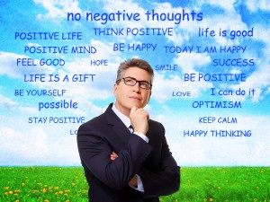 Positive thinking man over abstract background.